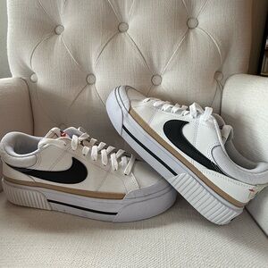 Nike Women's White Low-Top Sneakers with Black Swoosh and Tan Accent Size 8